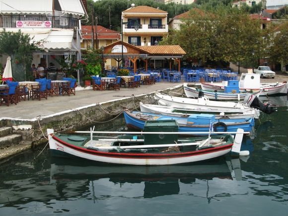 Fishing boats at the quay at George\'s Taverna in Kalamos harbour